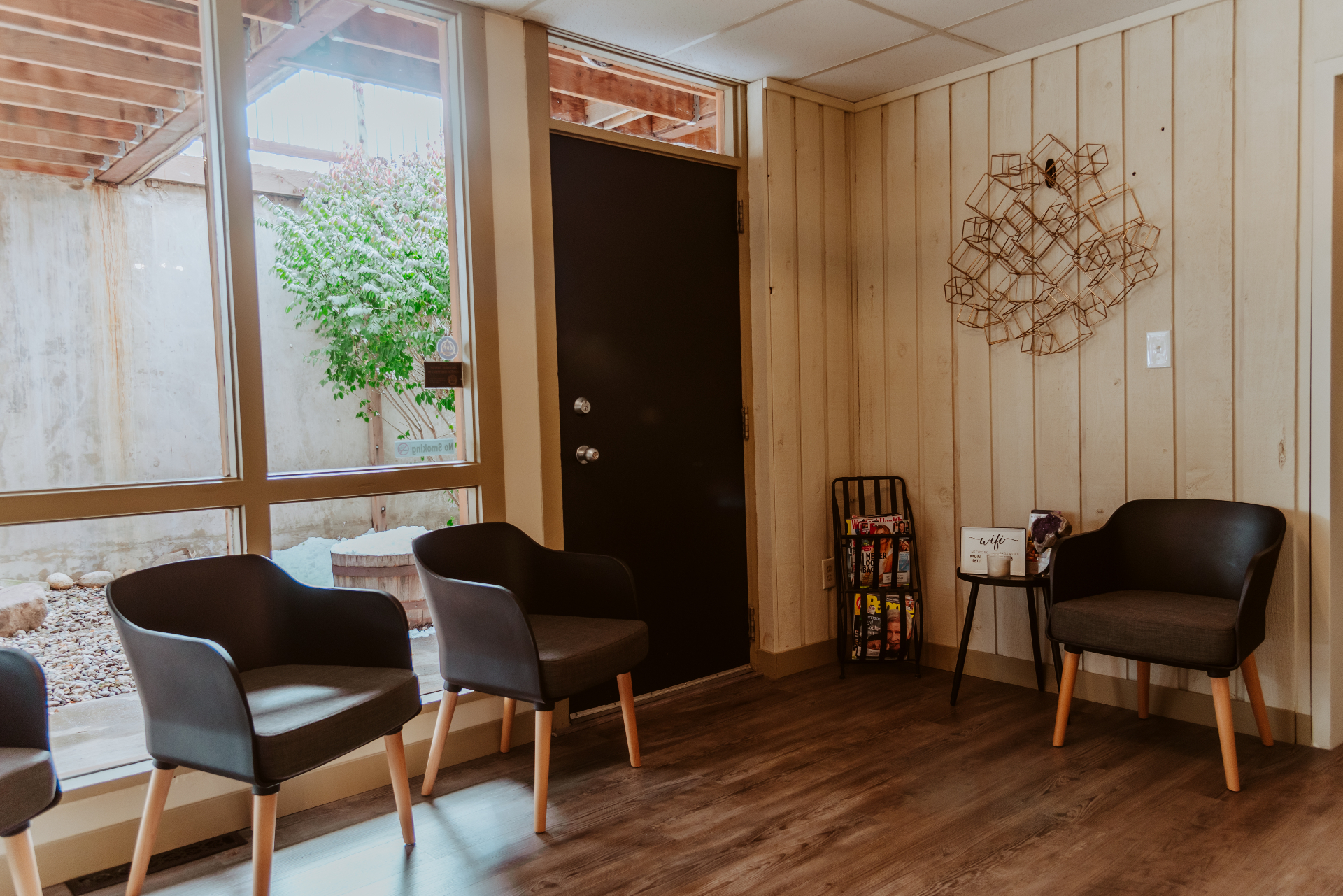 Calm, naturally lit waiting space inside Mon Petit Salon Et Spa, Colorado